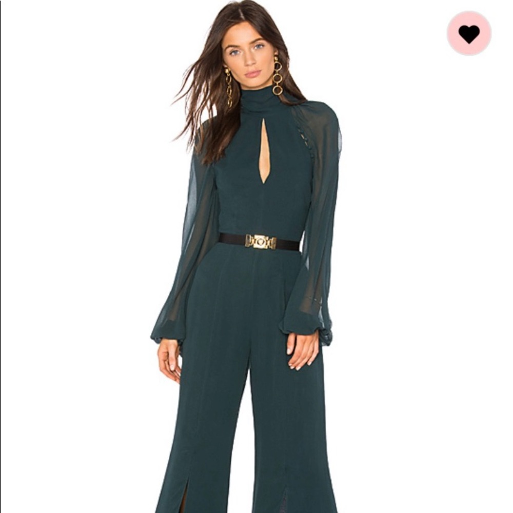 New jumpsuit stunning in person.  sold out size 4.
